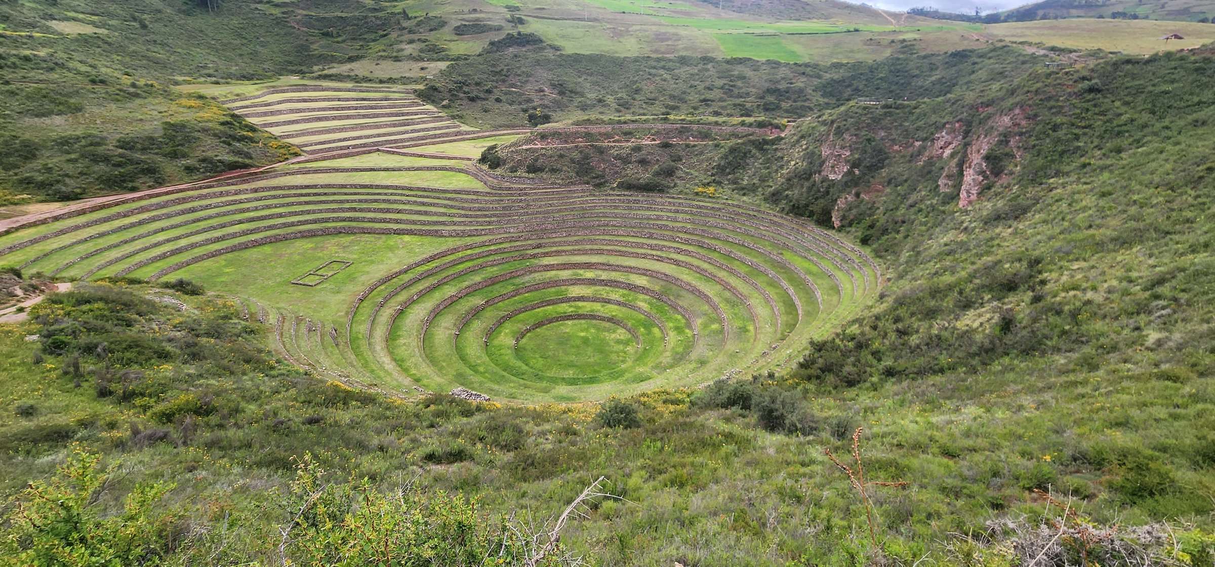 Aerial view of Moray circular agricultural terraces in Sacred Valley Cusco